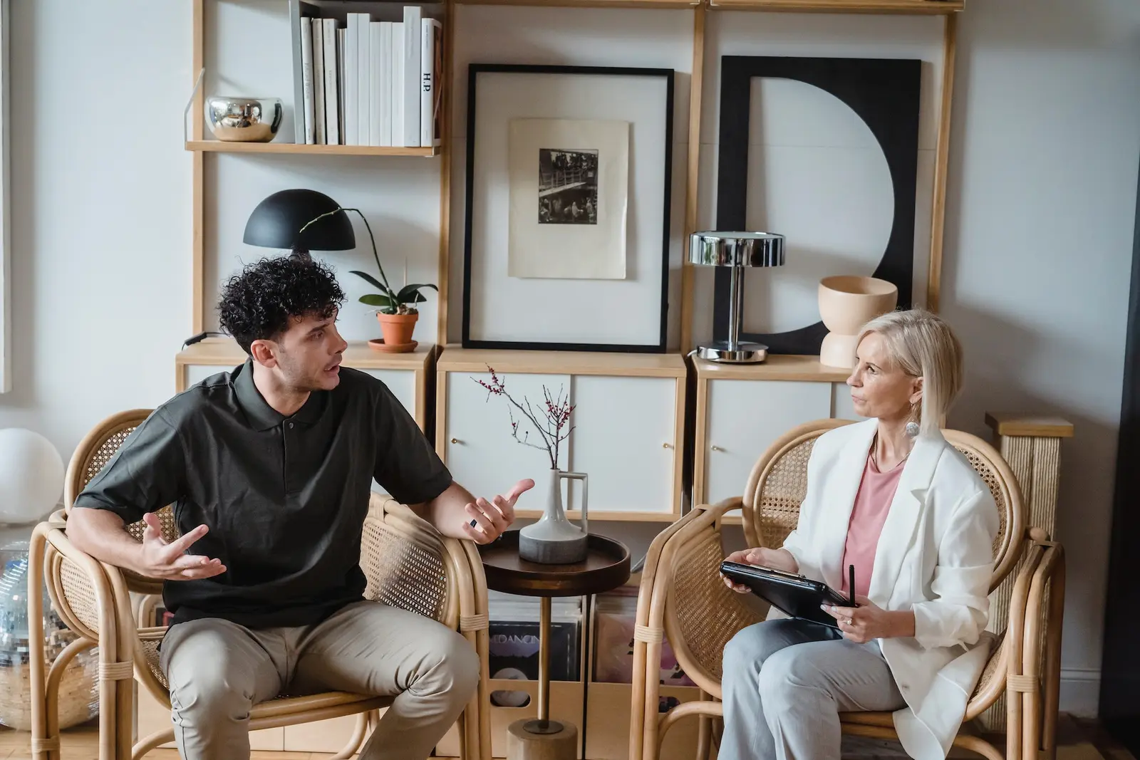 An adult talking through a difficult conversation with a counselor