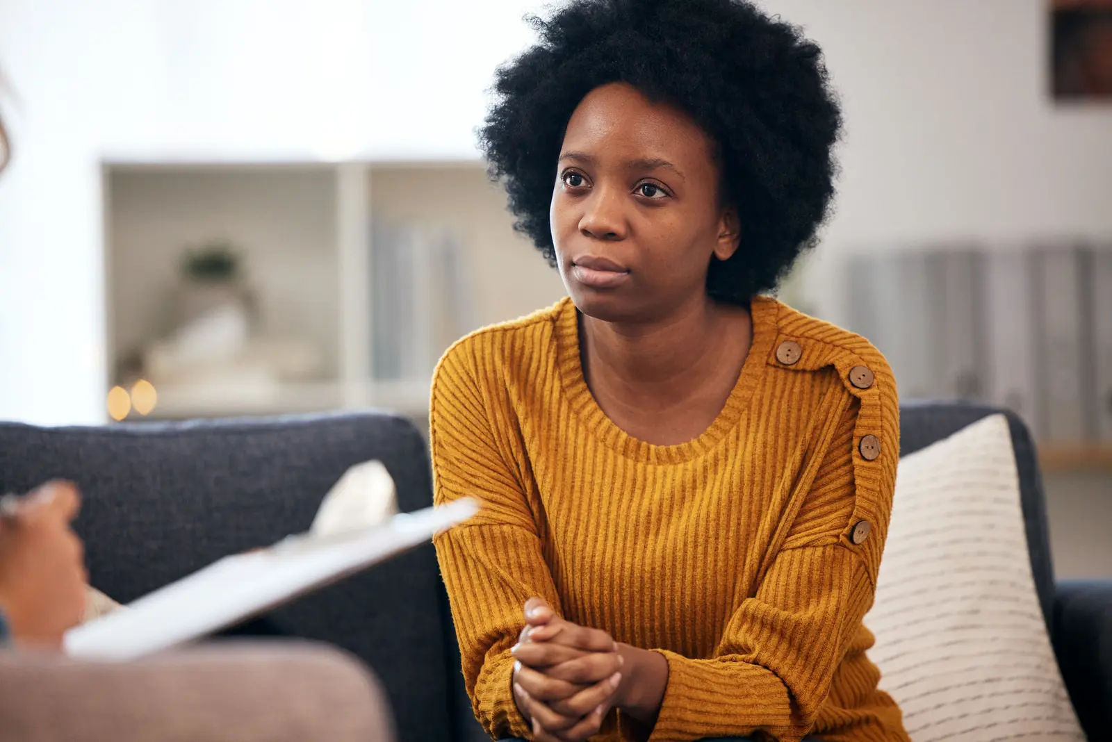 A woman in a one-on-one session with her clinician