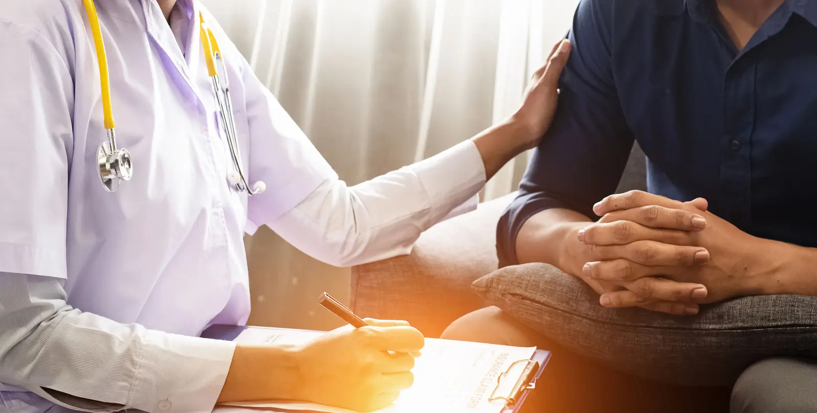 Clinician sitting with a patient during a depression treatment consultation