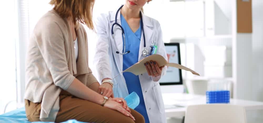 doctor speaking with patient